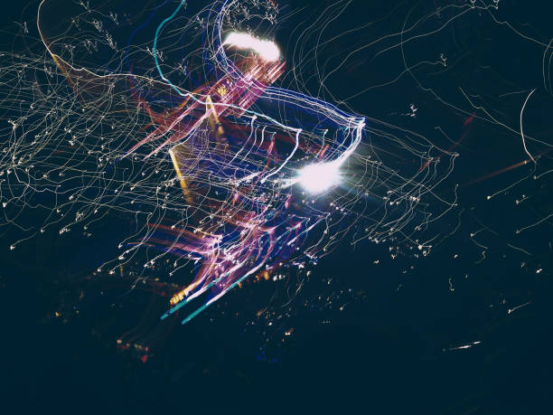 istock Light Painting, Painting With Light Using The Multicolored Bulb 895972432