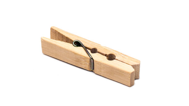 istock Wooden clothespin, isolated on white background 895983558