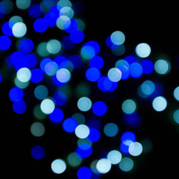 istock Colour Christmas bokeh on a dark background. 895983804