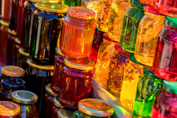 istock Pots with different sorts of honey 895988652