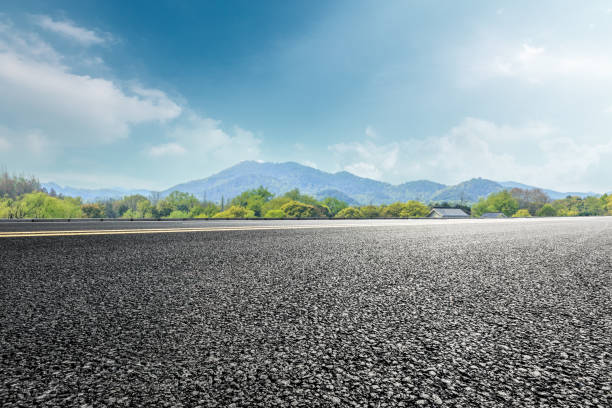 istock asphalt highway and mountain nature landscape under blue sky 895993770