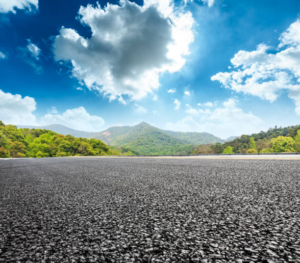 istock asphalt highway and mountain nature landscape under blue sky 895994384