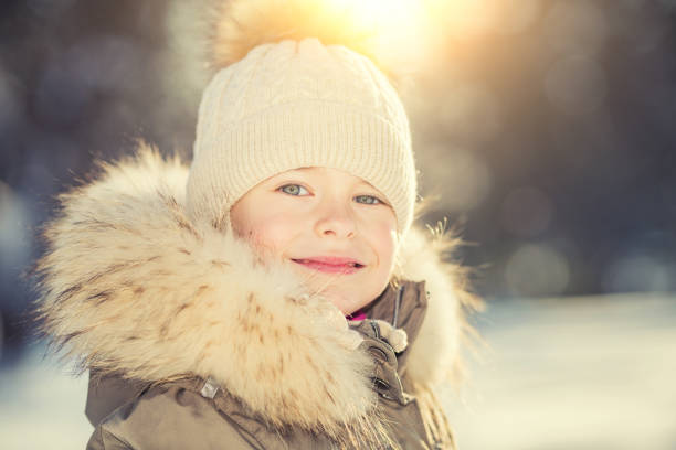 istock Little girl in a winter park 895997866
