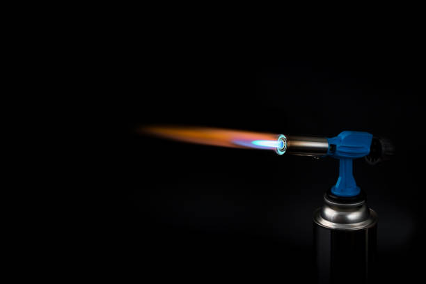 flame of a gas burner on a black background flame from a household gas burner with a ballon on a black background butane photos stock pictures, royalty-free photos & images