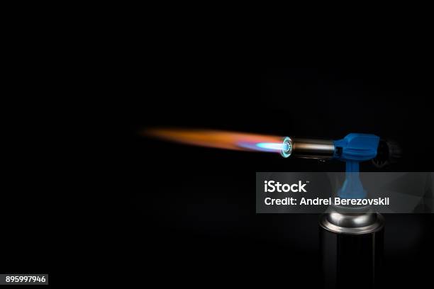 Flame Of A Gas Burner On A Black Background Stock Photo - Download Image Now - Flaming Torch, Propane, Flame