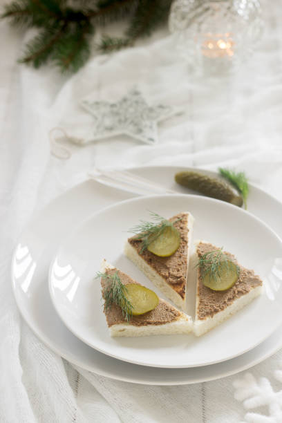 istock Canape with pate, canned cucumber and dill. Snack. Selective focus. 896013264