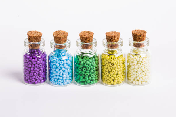 istock Colorful beads in the bottles 896022008