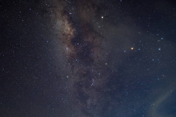 istock milky way galaxy, Long exposure photograph, with grain. 896029090