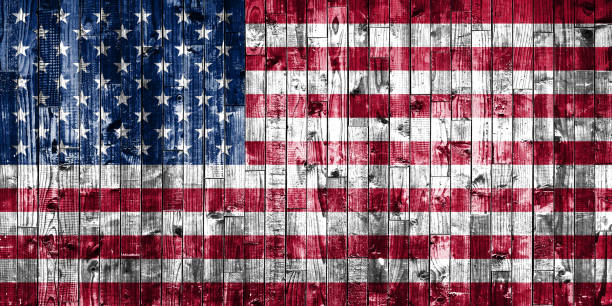 istock National Flags and wooden background 896031416