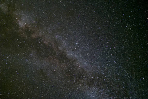 istock milky way galaxy, Long exposure photograph, with grain. 896031436