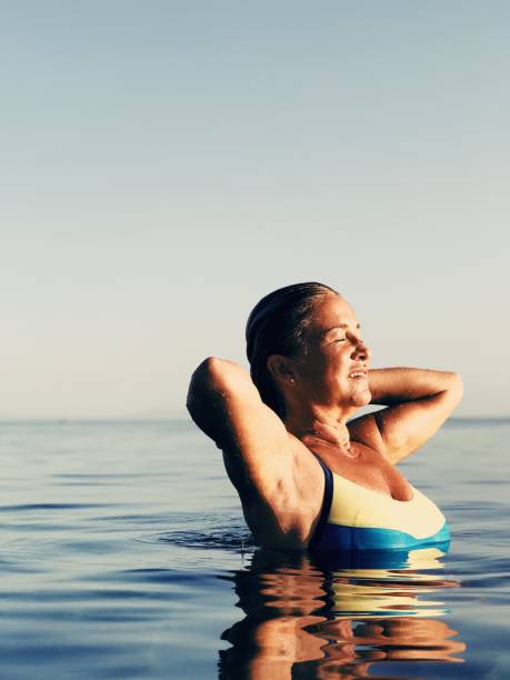istock Woman in the Sea 896031784