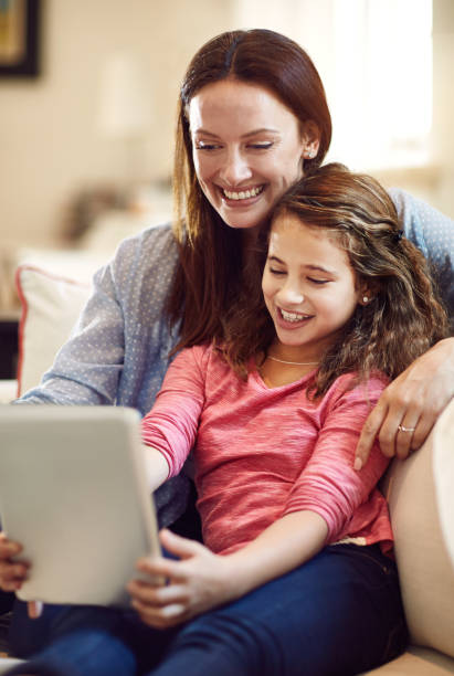 istock Mom and daughter selfie 896032066