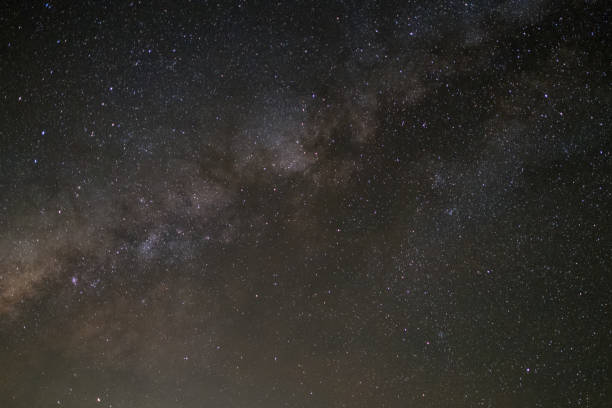 istock milky way galaxy, Long exposure photograph, with grain. 896032344
