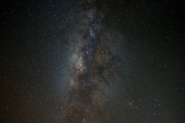 istock milky way galaxy, Long exposure photograph, with grain. 896032780