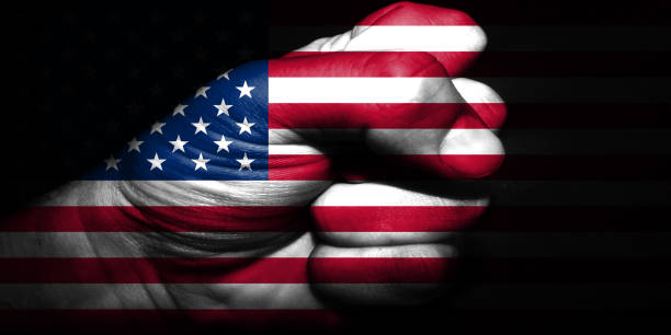 istock National flags with punch figure on the black background 896049316