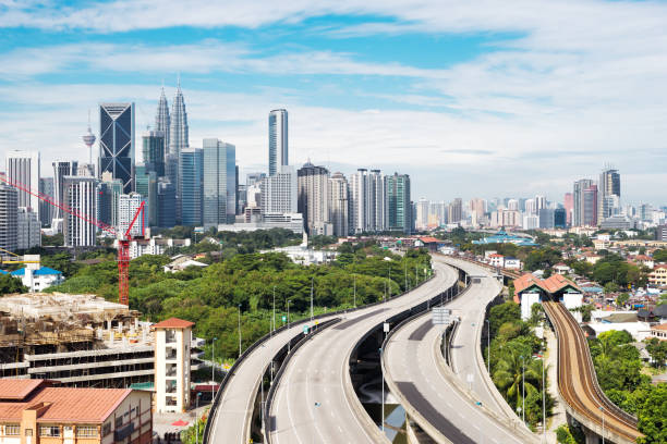 istock elevated road through modern city in cloud sky 896049388