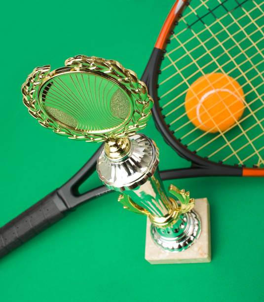 winning tennis tournaments