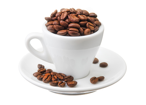 Cup with coffee beans isolated on white background