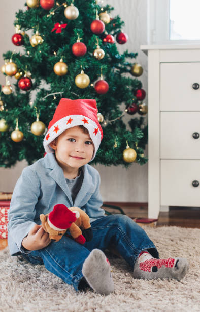 istock Cute little boy with Christmas hat 896076276