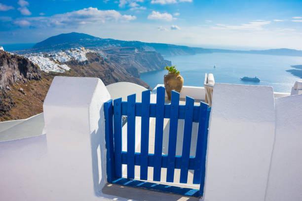 istock Blue gate and sea view on Santorini island, Greece 896076478