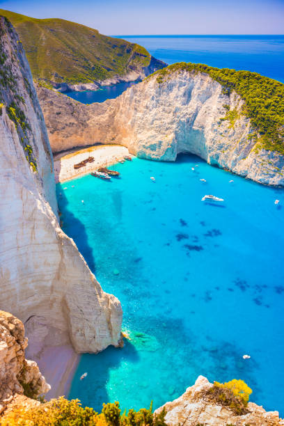 Shipwreck beach on Zakynthos island in Greece rocky coastline in Greece with crystal clear waters zakynthos stock pictures, royalty-free photos & images