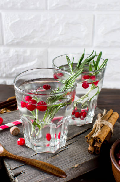 istock cocktail with cranberry, rosemary and ice 896079868