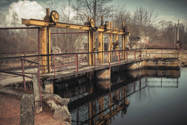 Vintage dam on the Oredezh River. Leningrad Oblast, Russia. Tonal correction filter
