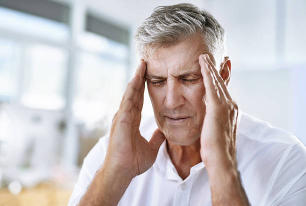 istock Trying to be productive but this headache isn't helping 896115336