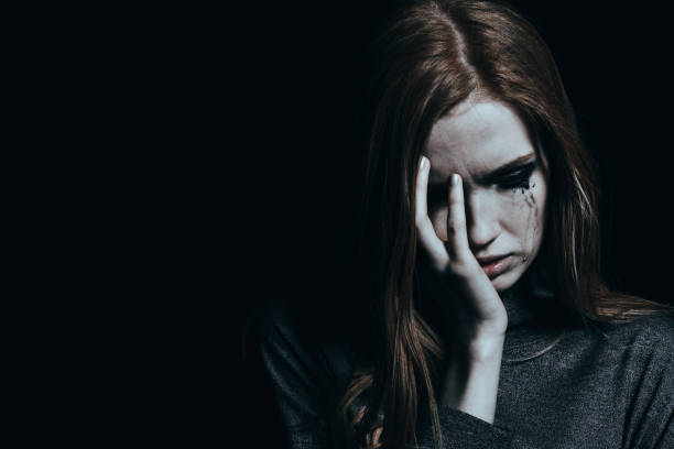 istock Crying young girl with depression 896115450