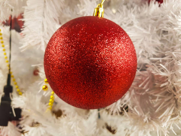istock Red Christmas ball hanging on Christmas tree 896120330