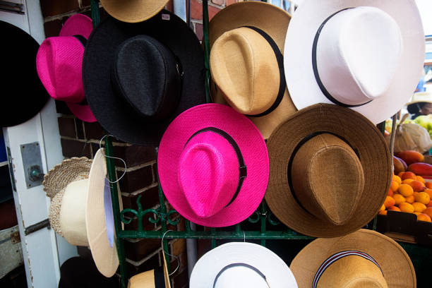 istock Many hats hanging on a shop wall for sale 896128694