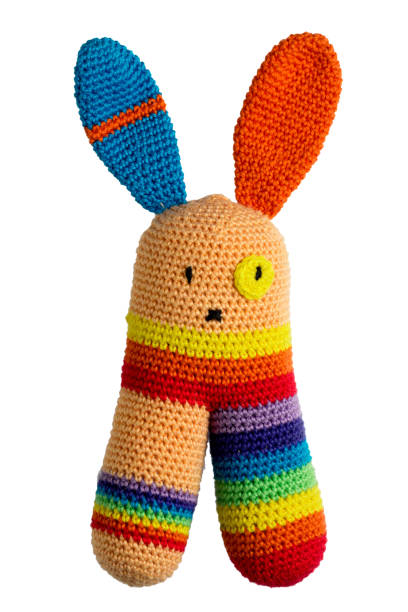 istock amigurumi crocheted stripped rabbit toy isolated on white background 896144446