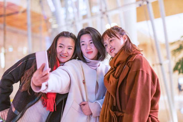 istock Best friends are taking a selfie with their phone 896147516