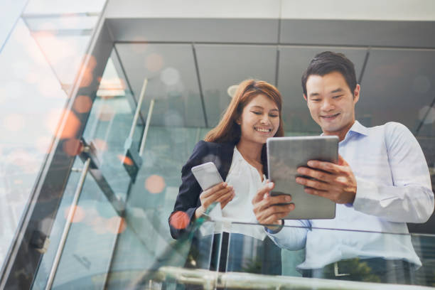 istock Using technology during business travel in Singapore. 896148094