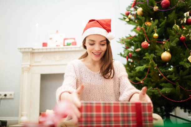 istock Christmas Surprise for Pretty Woman 896157518
