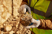 Miner Holding Chunk of Mineral