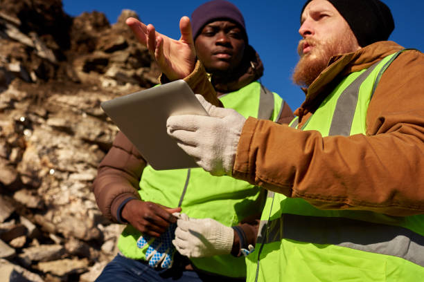 istock Gold Miners Inspecting Land 896157854