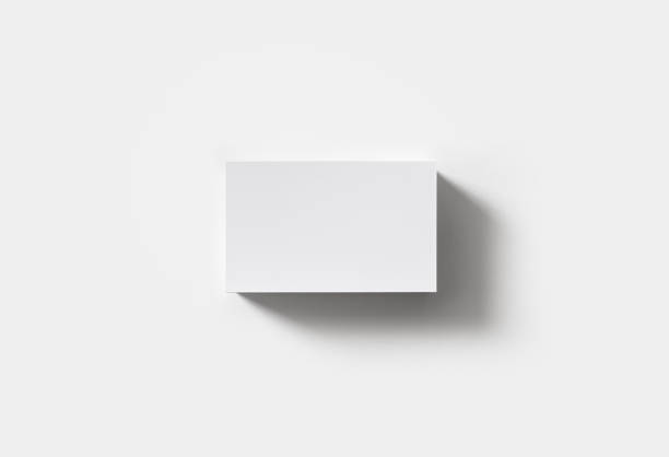 Blank business cards Stack of blank business cards on white paper background. Flat lay. business card photos stock pictures, royalty-free photos & images
