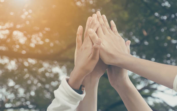 Team work and together concept, Hand of people high five for tag team Team work and together concept, Hand of people high five for tag team business relationship photos stock pictures, royalty-free photos & images