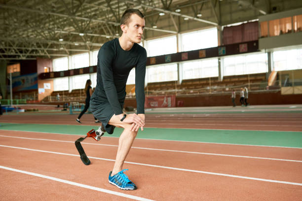 istock Handicapped Sportsman Stretching 896171294