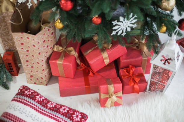istock Many boxes wrapped in red festive wrapping paper 896171564