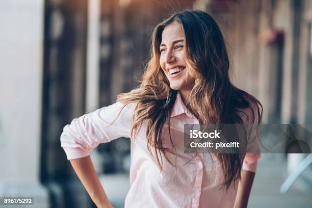 Laughing Young Woman Stock Photo - Download Image Now - Women, One Woman Only, Smiling