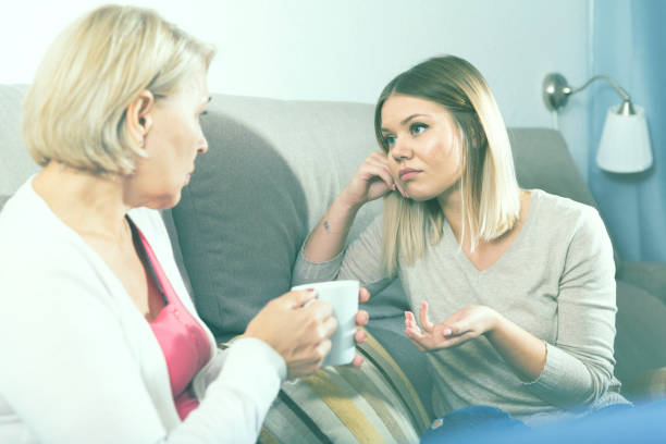 istock Mom and adult daughter talking 896183018