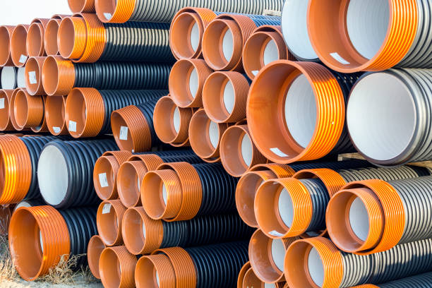 istock Pile of corrugated PVC sewer or drain pipes 896196086