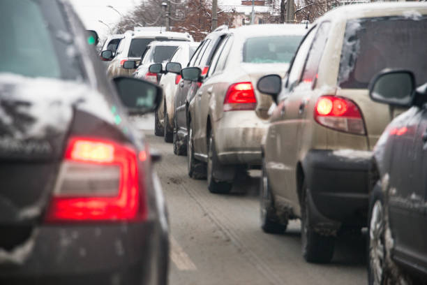 istock Cars in a traffic jam in winter 896198464