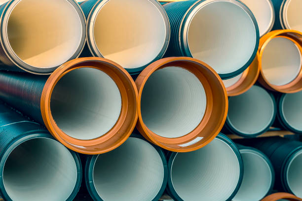 istock Pile of corrugated PVC sewer or drain pipes background 3 896199166