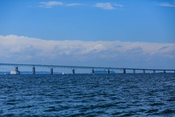 istock Span of Steel Bridge Over Blue Water 896208116