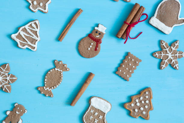 istock Christmas gingerbread cookies on blue table. Top view 896212062