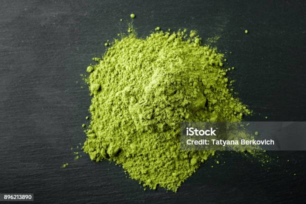 Matcha Tea Japanese Green Tea On A Black Stone Background Stock Photo - Download Image Now