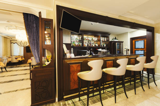 istock Hotel lounge bar with bottle shelfs and seats 896213986